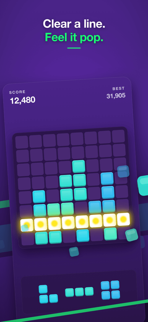 A full row of blocks clearing on the Boom Block board